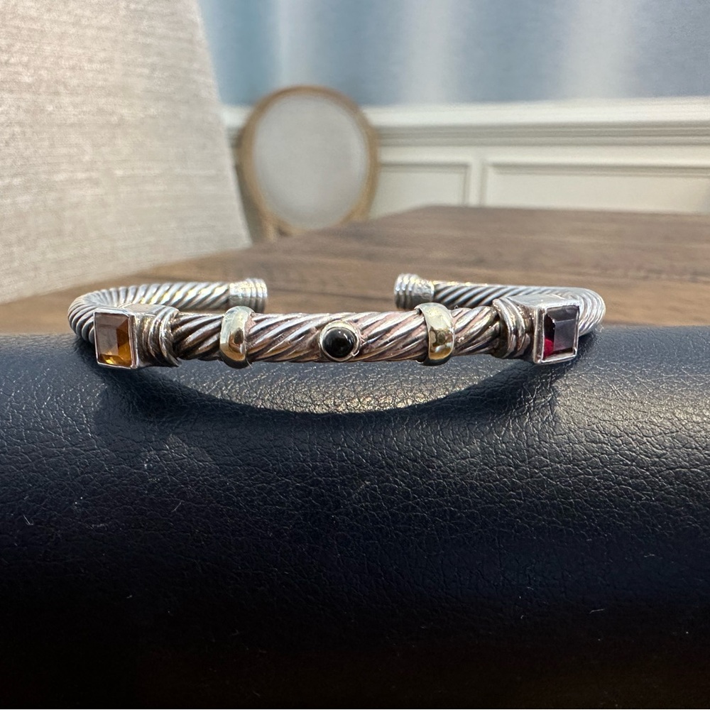David Yurman cable bracelet with gold and gems.